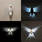 Illuminated Crystal Bird Lamp Casting Angel Wing Light Pattern