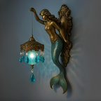 Coastal Mermaid Wall Sconce in Bronze with Blue Glass Globe