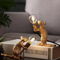 Gold Mouse Lamp Holding Light Bulb – Whimsical Decorative Table Light